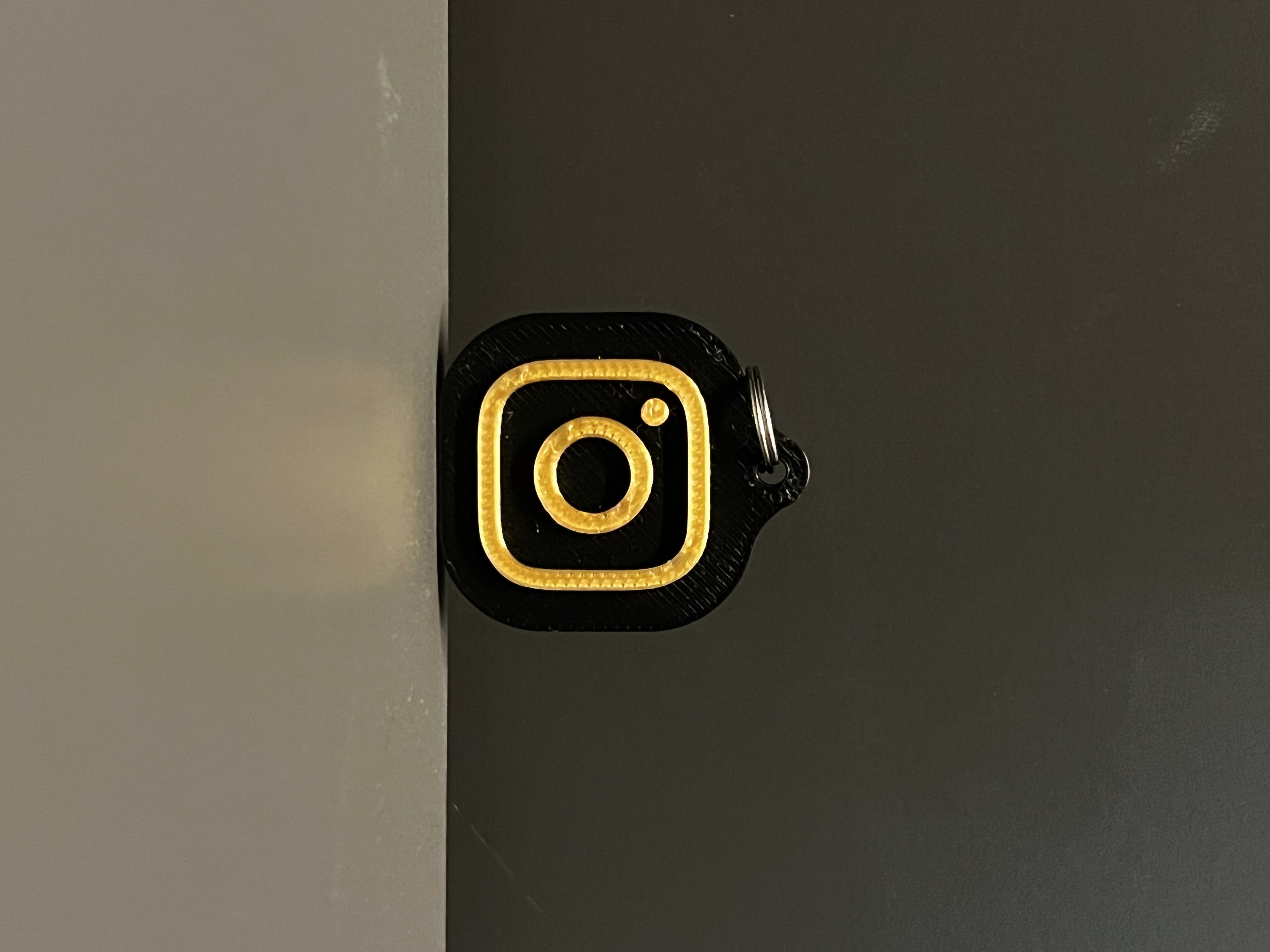 Black and gold Instagram NFC keychain — one tap opens your profile